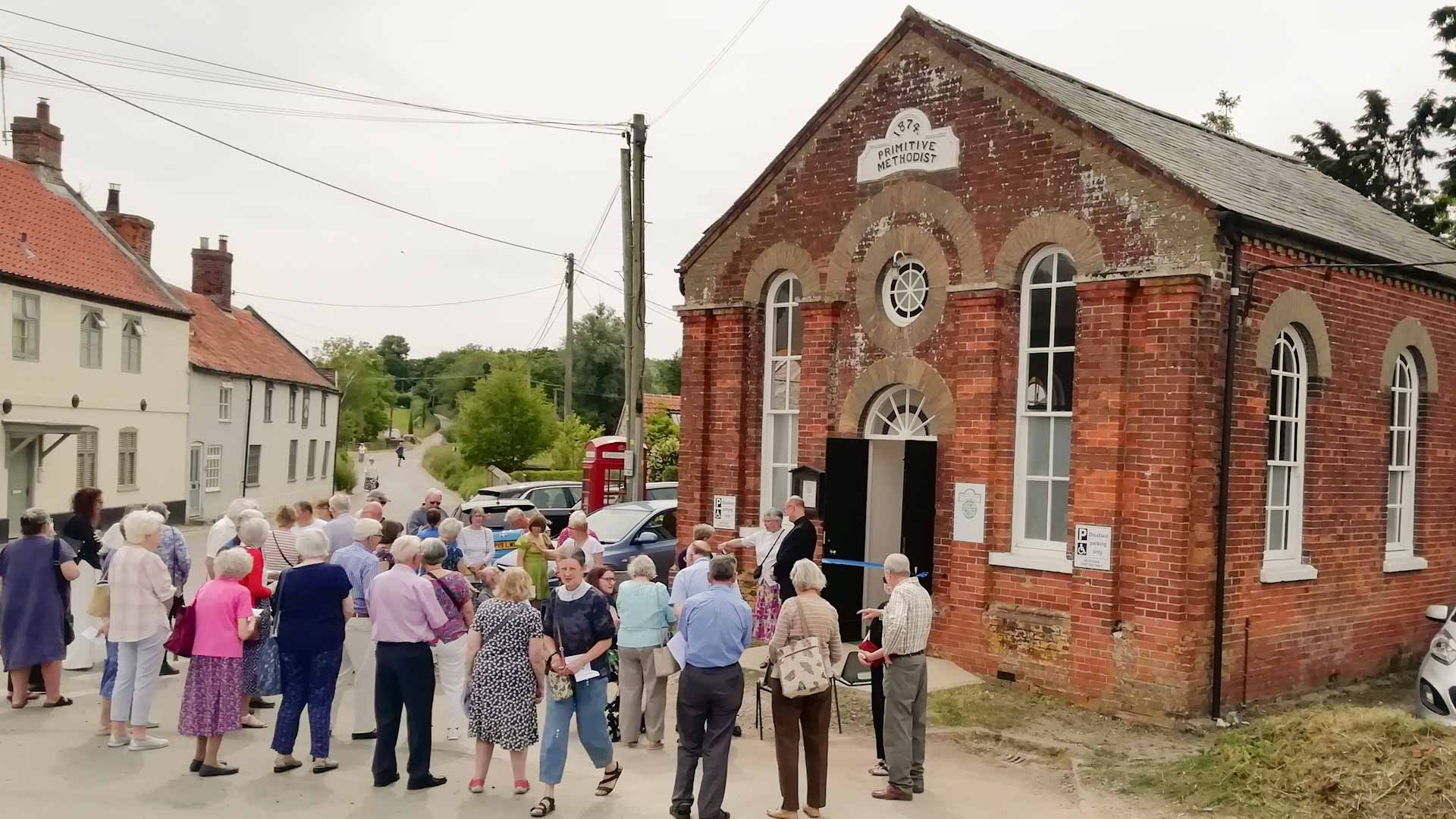 group of people gathering outside East Anglia Methodist Heritage Centre